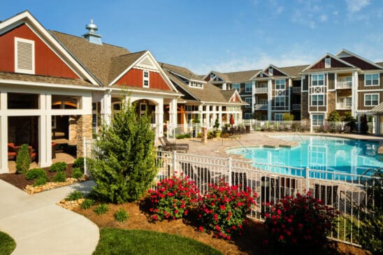 Apartment complex with pool and clubhouse exterior