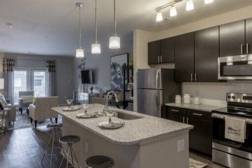 Modern kitchen with island and stainless steel appliances
