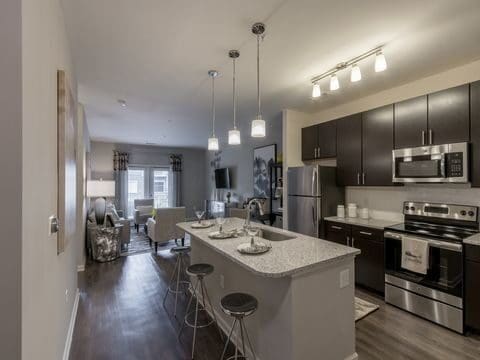 Modern kitchen with island and stainless steel appliances