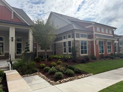 Modern office building with landscaped garden and walkway